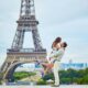 Couple in front of the Eiffel Tower