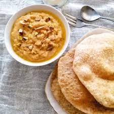 Best Food In Pakistan-Halwa Poori and Channay (Poori, Pudding, and Chickpeas)